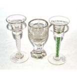 A Masonic engraved toasting glass and two wine glasses with twist stems (3)