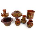 46 812 1318 2162 2165 2206 A Group of Seven Pieces of Linthorpe Pottery, all decorated with flowers,