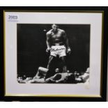 A Signed Limited Edition Mohammed Ali Boxing Print, numbered 19/50, framed and glazed, with