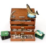 A Four Drawer Oak Cabinet Containing Flies, together with fly boxes, fisherman's knife and two