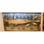 A Cased Taxidermy Pike Chasing Small Fish, preserved and mounted in a naturalistic setting,