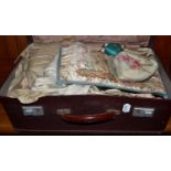 Case including Chinese cream silk panel embroidered in coloured silks, pair of child's red silk