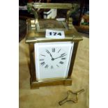 Large 19th c. French repeater carriage clock in gilt brass case with movement stamped Aiguilles,