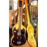 Electric bass guitar in case