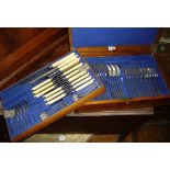 Oak canteen of cutlery by James Dixon, fifty-four pieces including carving set