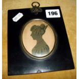 19th c bronzed silhouette of a woman with elaborate hairstyle