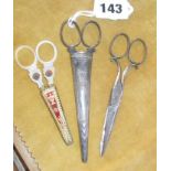 Victorian sewing scissors in silver case, another in gilded leather case & having carved mother-of-