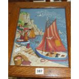 Colourful woolwork picture depicting a harbour scene with sailing boats & figures, in oak frame