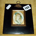 19th c. portrait miniature of a young lady with long hair and a hat