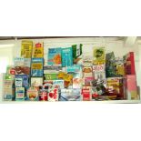 A collection of old food packaging (some with contents), including Jiffy, Brownies, Herbal Teas,