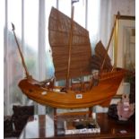 Large wooden model of a Chinese junk on stand