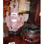 Chinese figural carved rose quartz bottle with lid