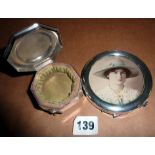 Silver octagonal trinket box on four legs (2.5" diameter), and a circular silver photo frame