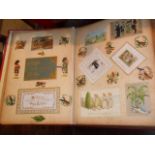 Good Victorian scrap album of Christmas Cards and coloured printed scraps, together with "History of