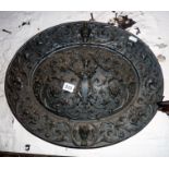 Ornate 19th c cast iron oval plaque by the American Radiator Company, depicting a classical figure