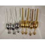 Seven hydrometers, four of which brass a