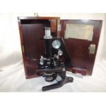 A Watson Barnet microscope, marked Servi