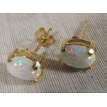 A pair of 9ct gold and opal stud earring