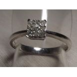 A lady's 9ct gold cluster ring set with