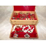 A jewelry box containing a collection of