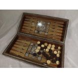 An ornate games board containing a vario