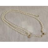 A lady's pearl necklace with 9ct gold cl