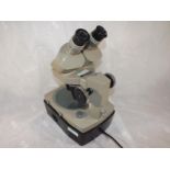 An electronic binocular microscope by Vi