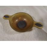 A Scottish Gaelic quaich with white meta