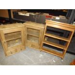 Three wall mounted pine cabinets of whic