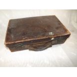 An early 20th century small leather case