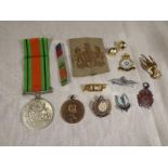 A World War two (WWII) defence medal and