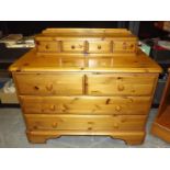 A pine chest of drawers