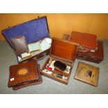 Three mid 20th century leather suitcases
