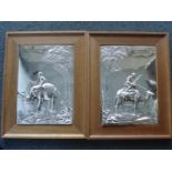 Two silver plated wall plaques with reli
