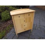 A light wood modern chest of drawers 109