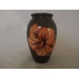 Moorcroft Pottery - a small baluster vas