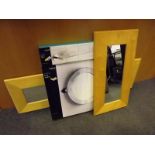 Two modern beech framed wall mirrors, a