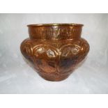 An Oriental copper jardiniere with relie