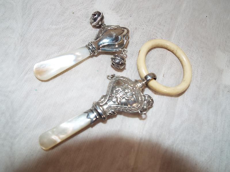 A George V child's silver hallmarked rat