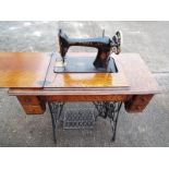 A mahogany cased Singer sewing machine t
