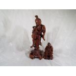 Two good quality Japanese carved figures