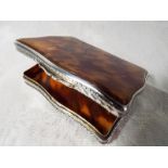 A tortoise shell snuff box with silver m