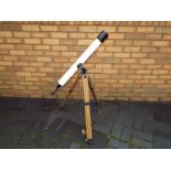 An Aloma telescope and tripod, 40 x 60mm