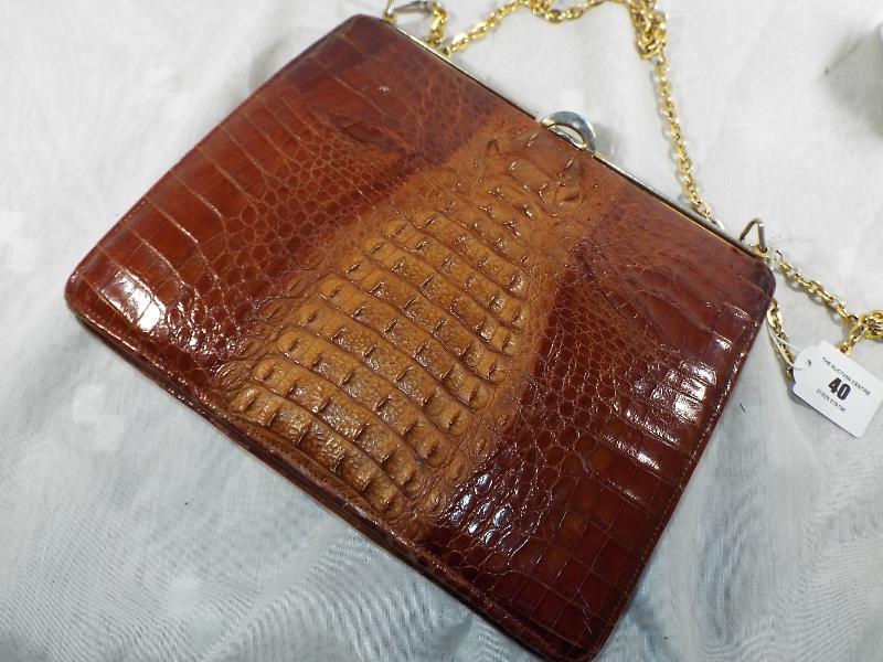 A lady's alligator skin handbag, leather