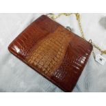 A lady's alligator skin handbag, leather