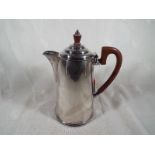 A silver plated coffee pot