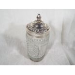 A Victorian cut glass sugar castor with