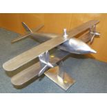 An aluminium model depicting a bi-plane