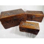 Three graduated camphor chests ranging i