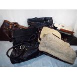 Seven lady's handbags predominantly leat